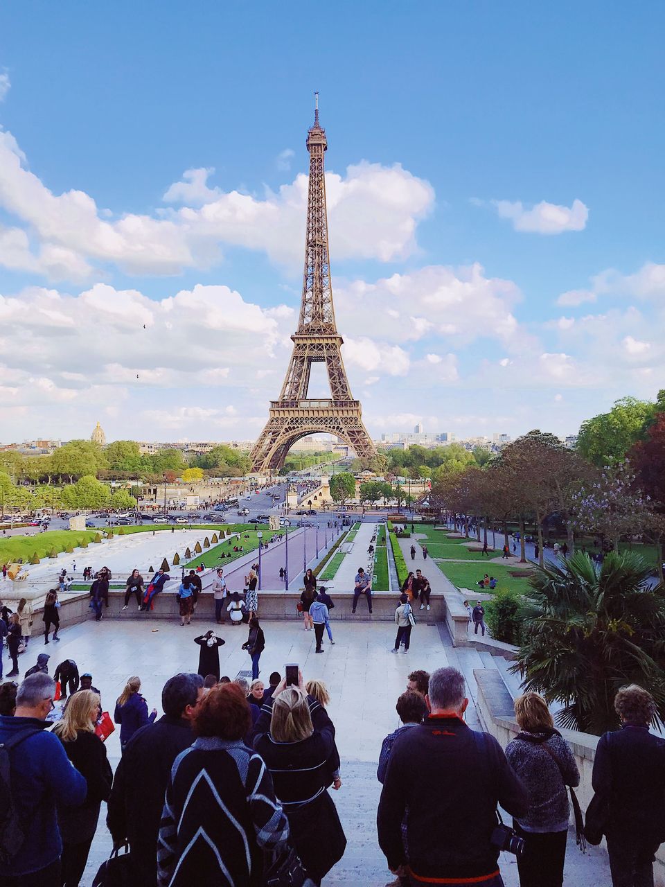 Group of people overlooking the Eiffel Tower from the Trocad&eacute;ro
